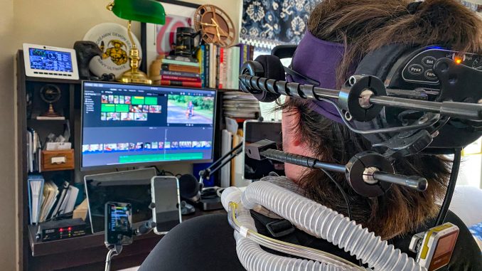 Buddy Marshall with assistive technologies