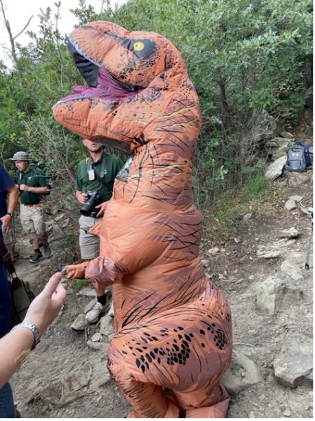 Philmont staffer in T-Rex costume