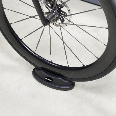 Bicycle riser blocks to secure a wheelchair